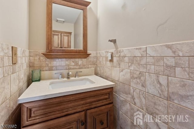 101 Pergola Ave, Monroe, NJ 08831 - bathroom with vanity, tile walls, and a wainscoted wall