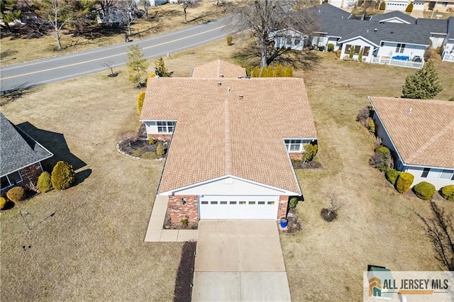 drone / aerial view with a residential view