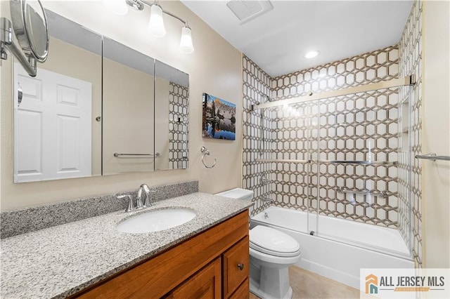 full bath featuring tile patterned flooring, vanity, toilet, and bathing tub / shower combination