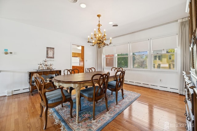 dining area with visible vents, recessed lighting, a baseboard heating unit, light wood-type flooring, and a notable chandelier