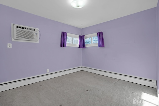 empty room featuring an AC wall unit, carpet, and a baseboard heating unit