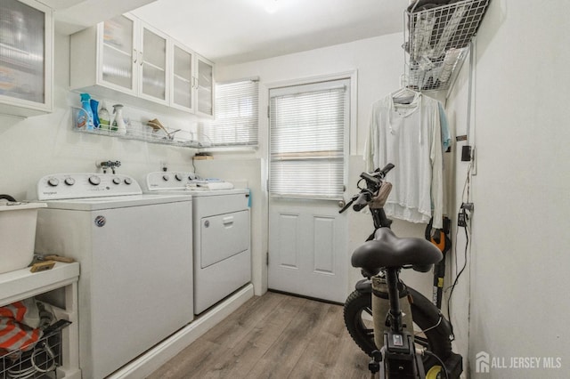 1 Hollywood Dr, Woodbridge Proper, NJ 07095 - washroom featuring separate washer and dryer and light wood-style flooring