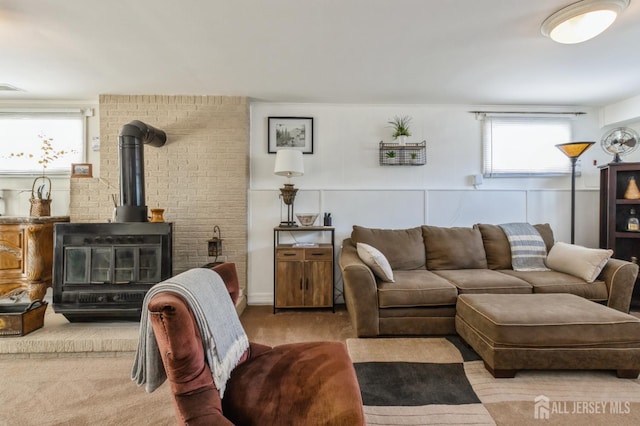 1 Hollywood Dr, Woodbridge Proper, NJ 07095 - living room with a wood stove and carpet flooring