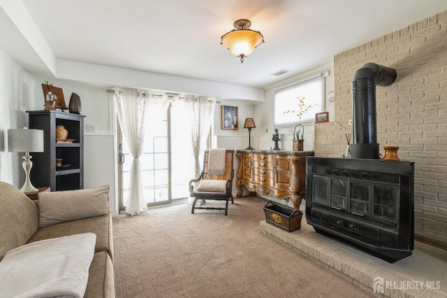 1 Hollywood Dr, Woodbridge Proper, NJ 07095 - living room with carpet and a wood stove