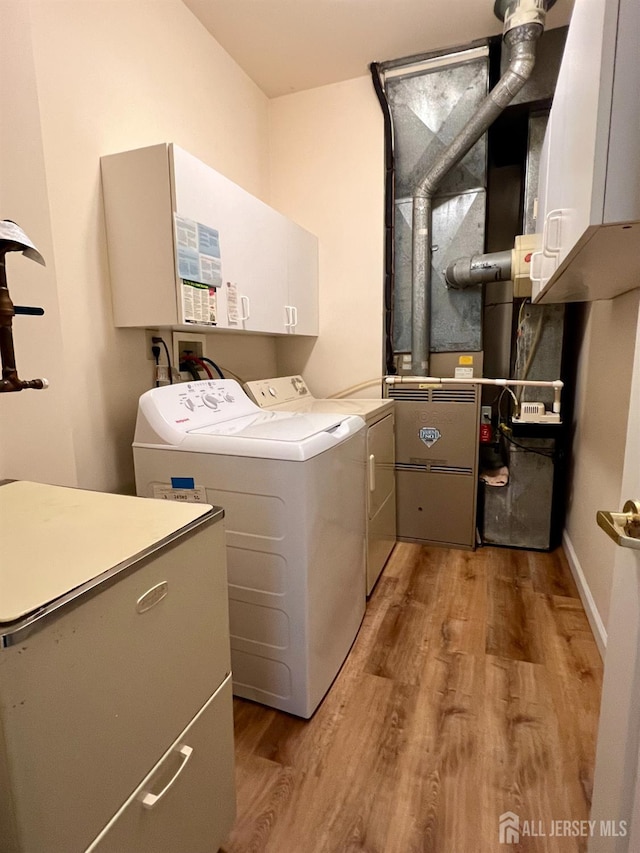 1 Walter Way, Monroe, NJ 08831 - washroom with cabinet space, washing machine and clothes dryer, and light wood-type flooring