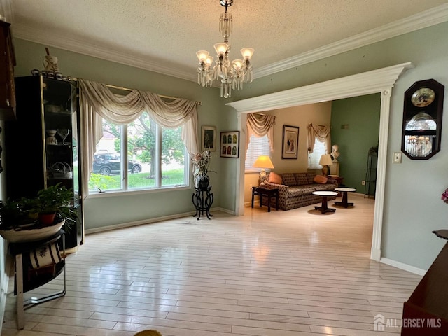 1 Walter Way, Monroe, NJ 08831 - living area with a chandelier, crown molding, a textured ceiling, and hardwood / wood-style flooring