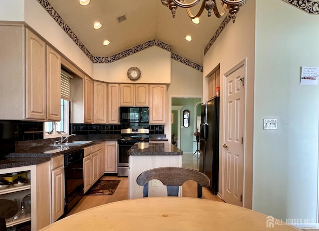 1 Walter Way, Monroe, NJ 08831 - kitchen with black appliances, tasteful backsplash, light brown cabinets, a kitchen island, and dark countertops