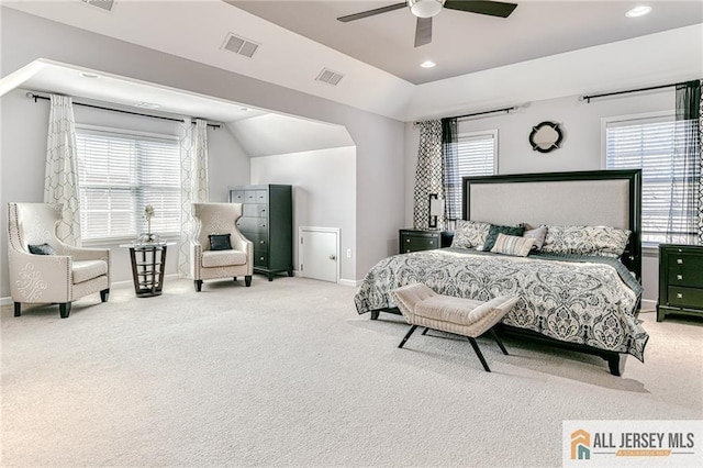 bedroom featuring baseboards, visible vents, multiple windows, and carpet floors