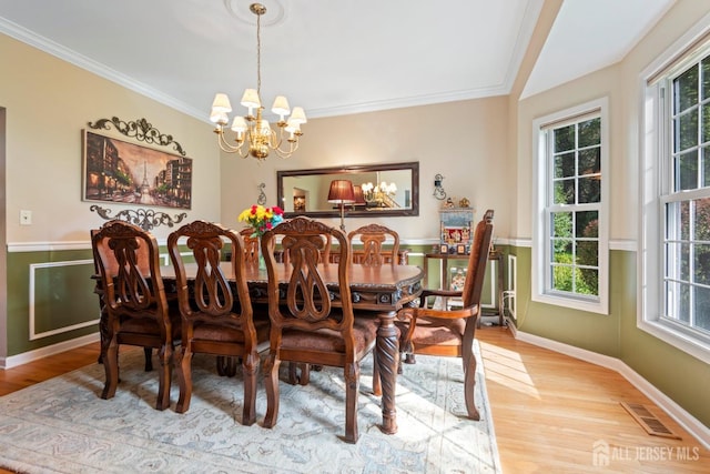 1 Mayfair Ln, Byram, NJ 07821 - dining space with visible vents, light wood finished floors, a healthy amount of sunlight, and an inviting chandelier