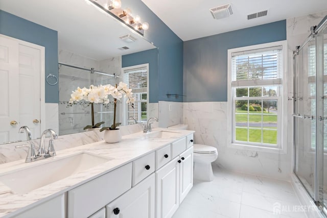 1 Mayfair Ln, Byram, NJ 07821 - full bath featuring a sink, visible vents, a shower stall, and marble finish floor