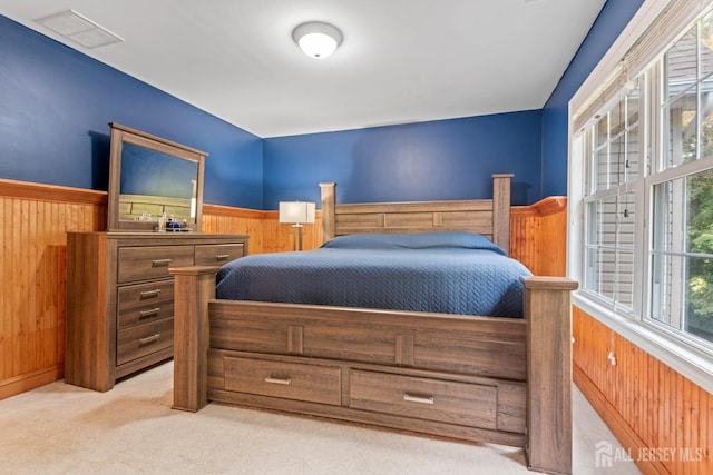 1 Mayfair Ln, Byram, NJ 07821 - bedroom featuring visible vents, carpet flooring, a wainscoted wall, and wood walls