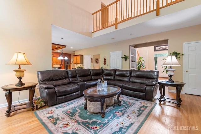 1 Mayfair Ln, Byram, NJ 07821 - living area with baseboards, recessed lighting, light wood-style flooring, and a high ceiling
