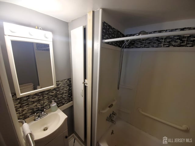 429 Wilfred Ave, Hamilton, NJ 08610 - bathroom featuring vanity, tub / shower combination, and backsplash