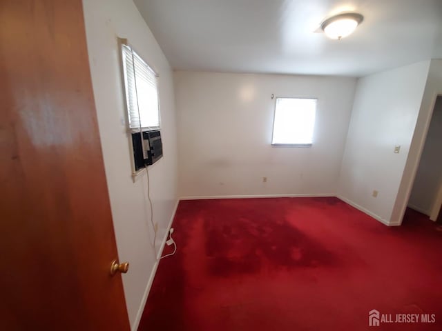 429 Wilfred Ave, Hamilton, NJ 08610 - carpeted empty room with plenty of natural light and cooling unit