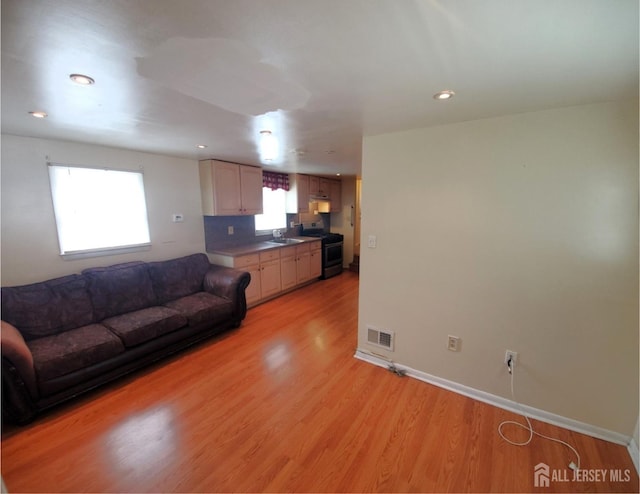 429 Wilfred Ave, Hamilton, NJ 08610 - living room featuring light wood finished floors and recessed lighting