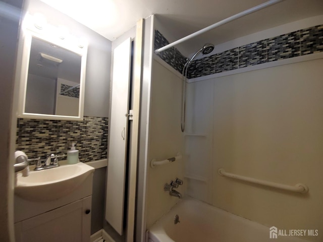 429 Wilfred Ave, Hamilton, NJ 08610 - full bath featuring vanity, washtub / shower combination, and decorative backsplash