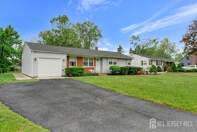 25 Orchard Rd, Middlesex, NJ 08846 - single story home featuring an attached garage, a front lawn, a chimney, and asphalt driveway