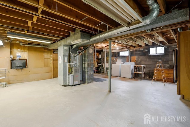 25 Orchard Rd, Middlesex, NJ 08846 - below grade area featuring washer and clothes dryer and heating unit