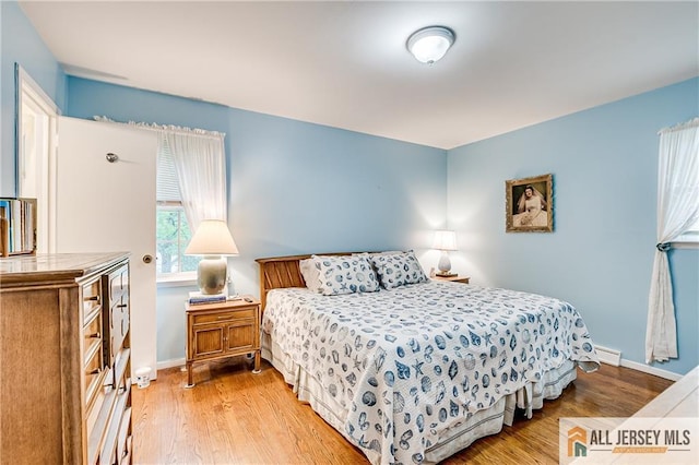 33 Larchmont Rd, Edison, NJ 08837 - bedroom featuring wood finished floors and baseboards