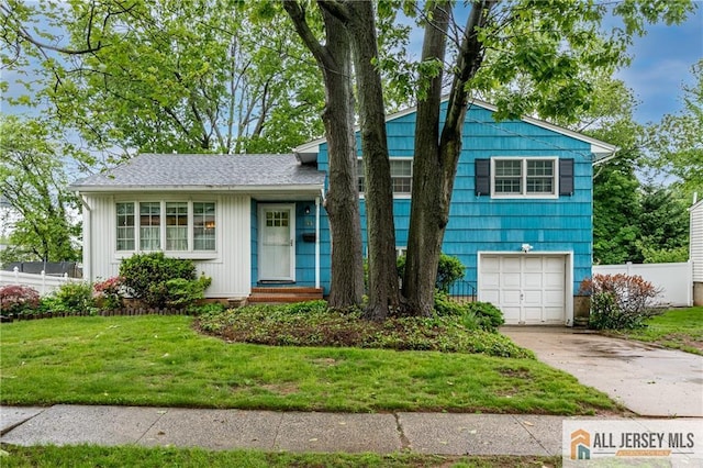 33 Larchmont Rd, Edison, NJ 08837 - tri-level home featuring concrete driveway and a garage