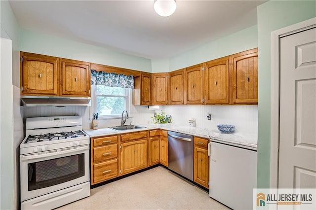 33 Larchmont Rd, Edison, NJ 08837 - kitchen with white gas range, dishwasher, a sink, light countertops, and brown cabinets