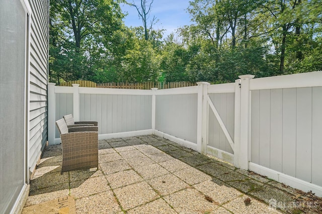 view of patio with fence