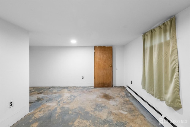 809 Summerfield Ave, South Amboy, NJ 08879 - unfurnished room with a baseboard heating unit and unfinished concrete floors