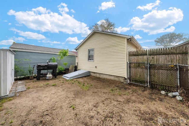 809 Summerfield Ave, South Amboy, NJ 08879 - rear view of house with a gate