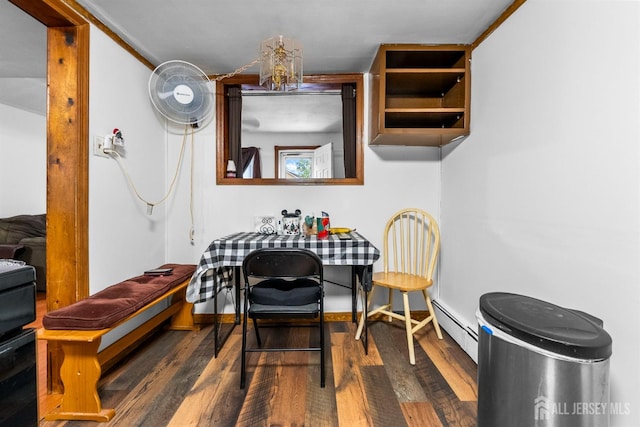 809 Summerfield Ave, South Amboy, NJ 08879 - dining room with a baseboard radiator and wood finished floors