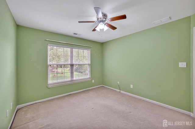 27 Rue Chagall, Franklin, NJ 08873 - carpeted spare room with baseboards and a ceiling fan