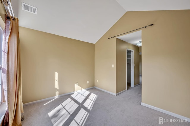 27 Rue Chagall, Franklin, NJ 08873 - unfurnished room featuring lofted ceiling and carpet floors