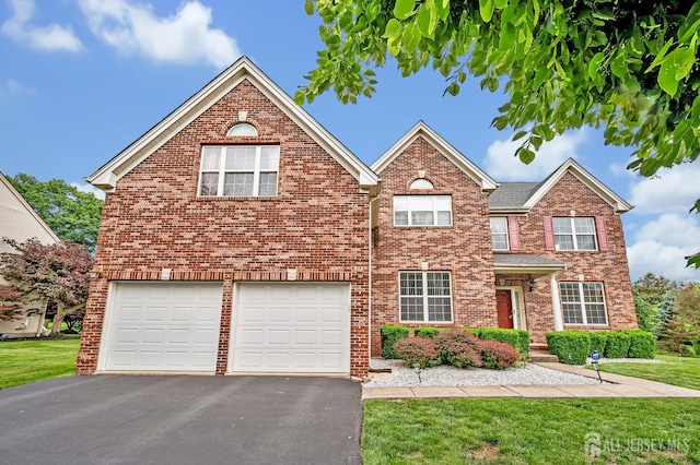 27 Rue Chagall, Franklin, NJ 08873 - traditional-style home featuring a garage, driveway, brick siding, and a front lawn