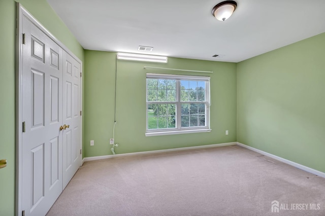 27 Rue Chagall, Franklin, NJ 08873 - unfurnished bedroom with carpet and a closet