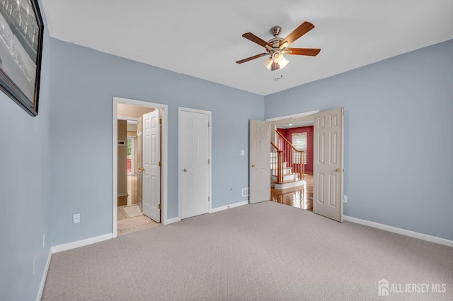 27 Rue Chagall, Franklin, NJ 08873 - unfurnished bedroom featuring carpet, connected bathroom, and ceiling fan
