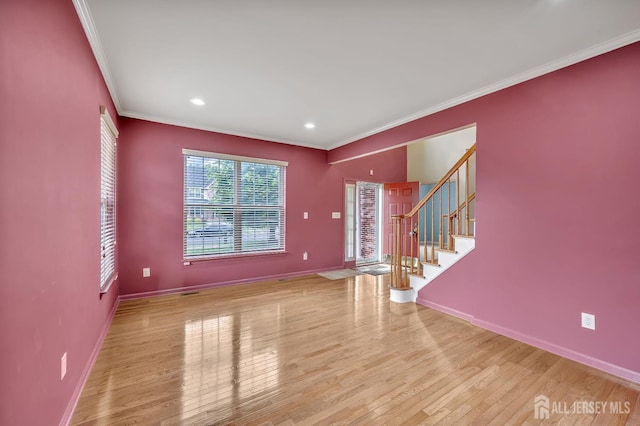 27 Rue Chagall, Franklin, NJ 08873 - unfurnished room with crown molding, wood finished floors, stairway, and recessed lighting