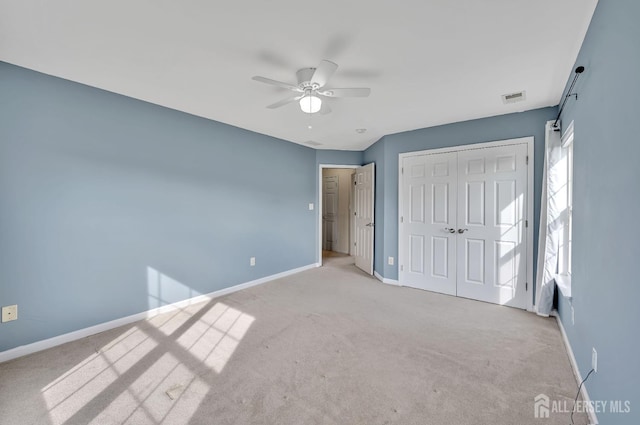 27 Rue Chagall, Franklin, NJ 08873 - unfurnished bedroom with carpet floors, a closet, and ceiling fan