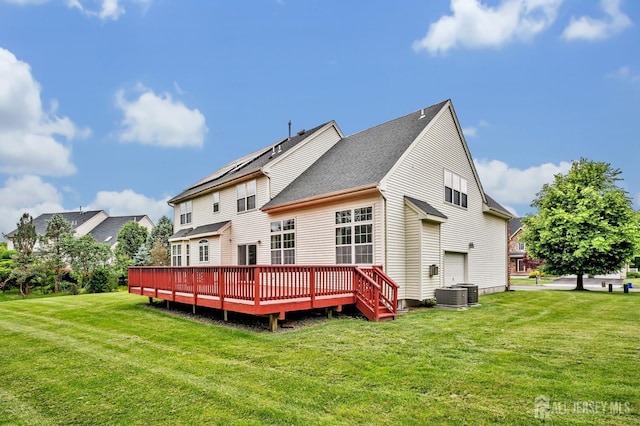 27 Rue Chagall, Franklin, NJ 08873 - back of house featuring a deck and a lawn