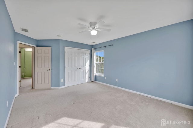 27 Rue Chagall, Franklin, NJ 08873 - unfurnished bedroom with a closet, light carpet, and a ceiling fan