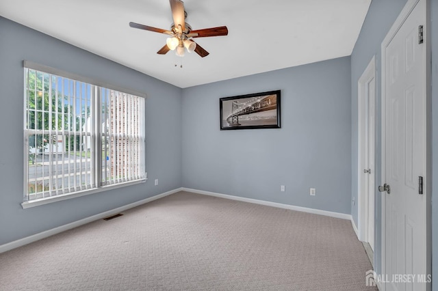 27 Rue Chagall, Franklin, NJ 08873 - unfurnished bedroom featuring carpet floors, a closet, and ceiling fan