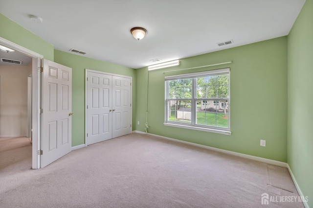 27 Rue Chagall, Franklin, NJ 08873 - unfurnished bedroom with carpet floors and a closet