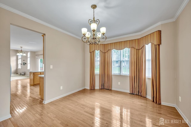 27 Rue Chagall, Franklin, NJ 08873 - unfurnished room featuring a chandelier, light wood-style floors, and crown molding