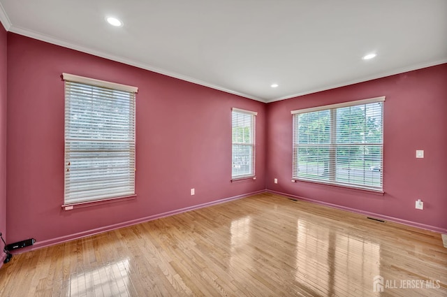 27 Rue Chagall, Franklin, NJ 08873 - unfurnished room featuring ornamental molding, light wood-type flooring, healthy amount of natural light, and recessed lighting
