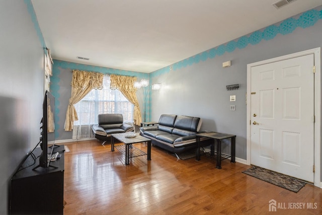 living room featuring wood-type flooring