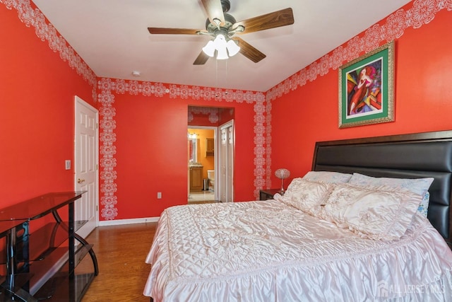 bedroom featuring hardwood / wood-style floors and ceiling fan