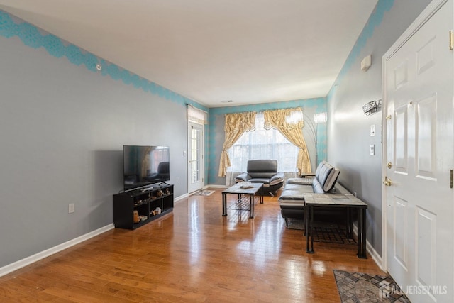 living room with wood-type flooring