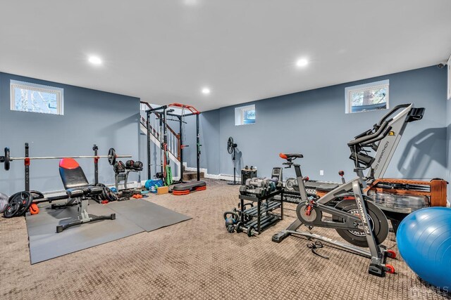 exercise area featuring carpet flooring