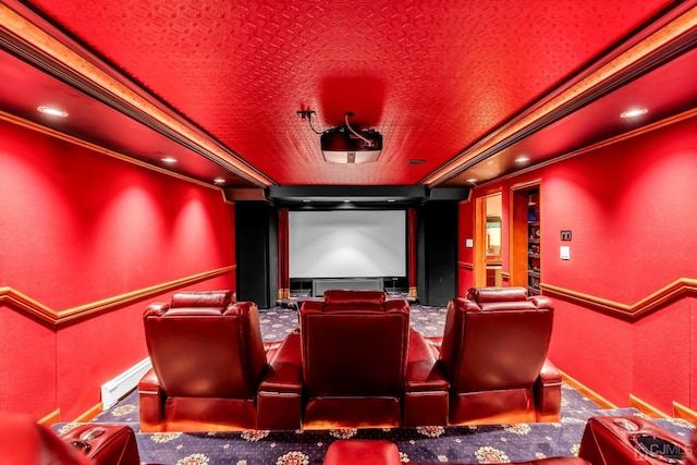 cinema with recessed lighting and crown molding