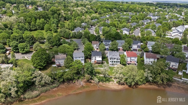 7 Cornell Dr, East Brunswick, NJ 08816 - aerial overview of property's location with a large body of water and nearby suburban area