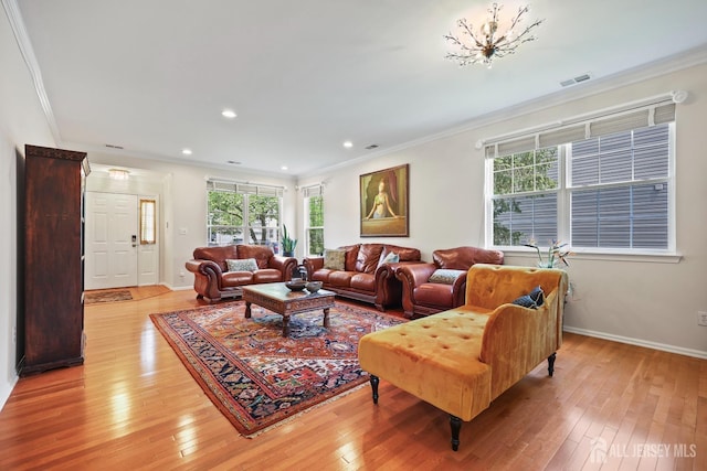 7 Cornell Dr, East Brunswick, NJ 08816 - living area featuring crown molding, light wood-type flooring, baseboards, and recessed lighting