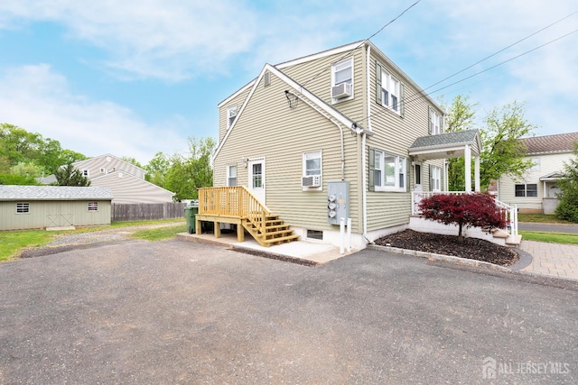 200 Plainfield Rd, Edison, NJ 08820 - view of side of property featuring cooling unit and a wooden deck